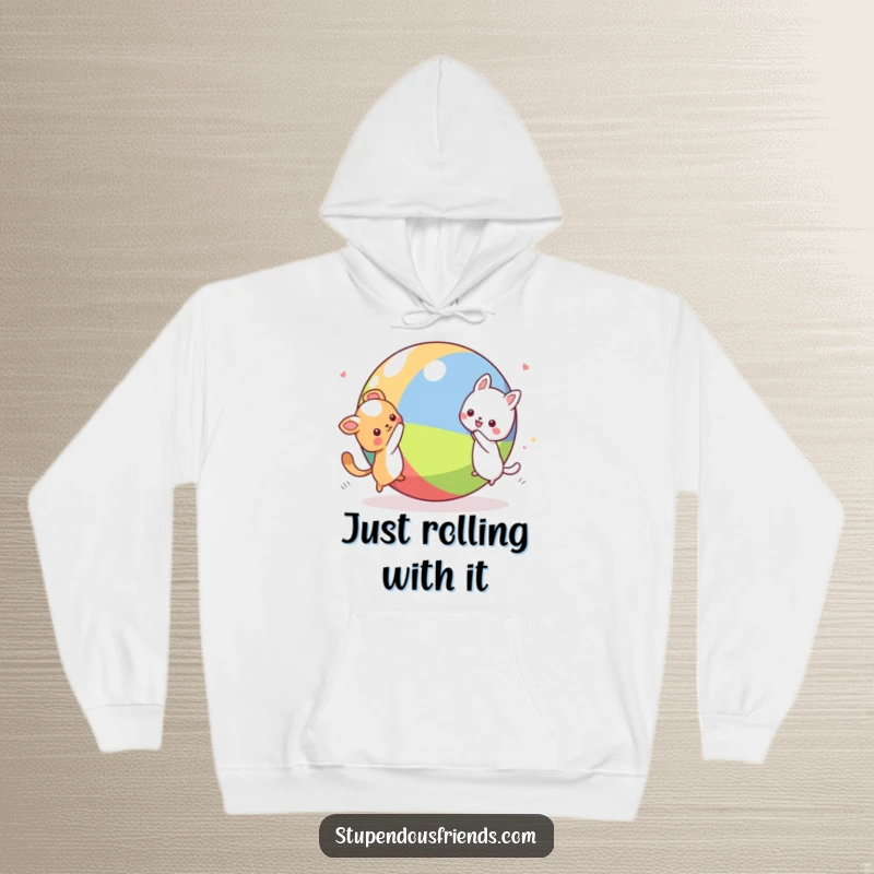 Funny Kawaii animal characters frolicking around a giant ball on a soft hoodie, a humorous and warm gift for animal lovers.