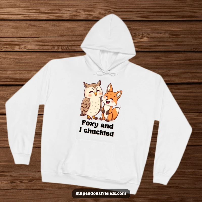 Funny hoodie showing an owl and a fox leaning into each other, laughing heartily. A perfect blend of cozy and comical.